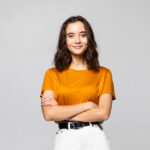 potrait beautiful young women standing hands crossed